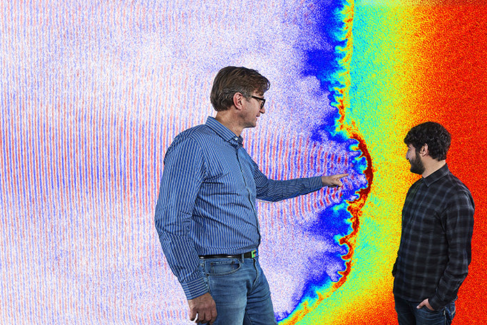 Researchers in front of a quantum simulation